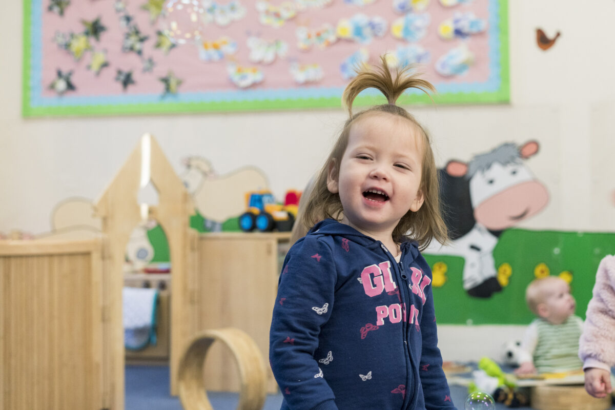 Toddler Room Girl Laughing